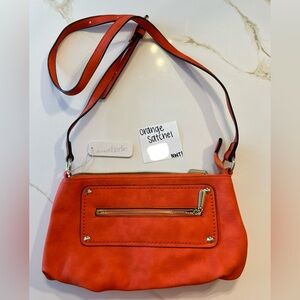 Orange satchel for sale. Good condition.